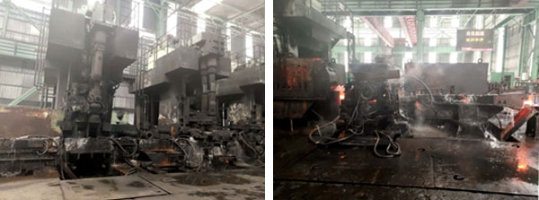 棒材運輸軌道上剛出爐鋼材 棒材運輸軌道上剛出爐鋼材